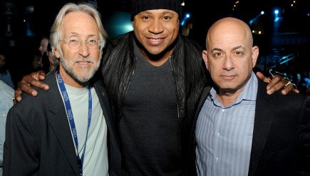 Recording Academy President and CEO Neil Portnow, host LL Cool J and Executive Vice President of Specials, Music and Live Events at CBS Entertainment Jack Sussman pose at the Staples Center in Los Angeles on Jan. 23, a few days before the 2014 Grammy Awards.