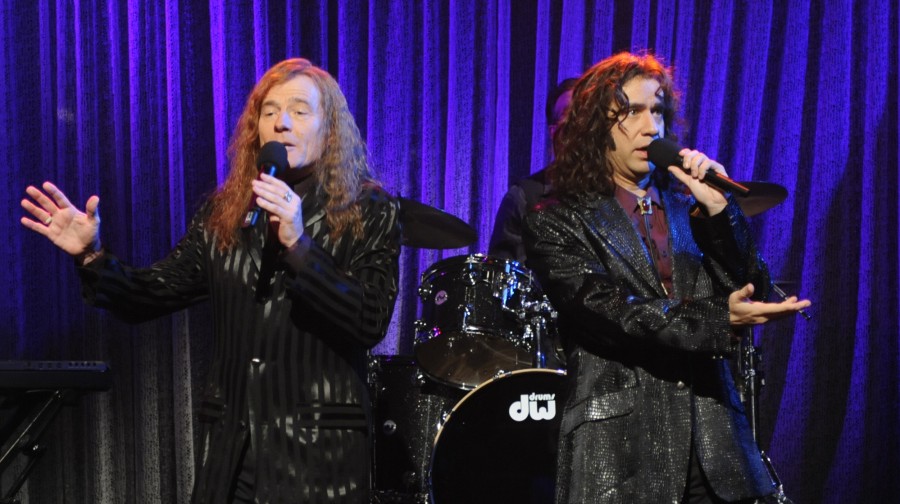 Bryan Cranston and Fred Armisen in character as The Bjelland Brothers, a sibling soft rock duo dreamed up by Armisen for a 2010 sketch on Saturday Night Live.