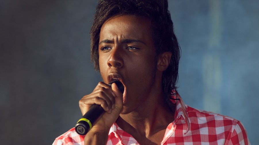 Mo performs in 2011, the year he rose to prominence on Norway's version of The X Factor.