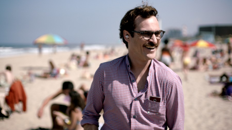 Beautiful Music Together: Joaquin Phoenix takes a walk on the beach with his girlfriend the Operating System in the Oscar-nominated film Her.