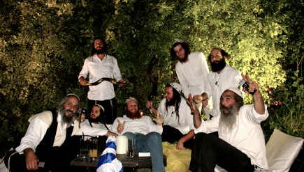 A group of Na Nachs goof off before a wedding performance in Tel Aviv.