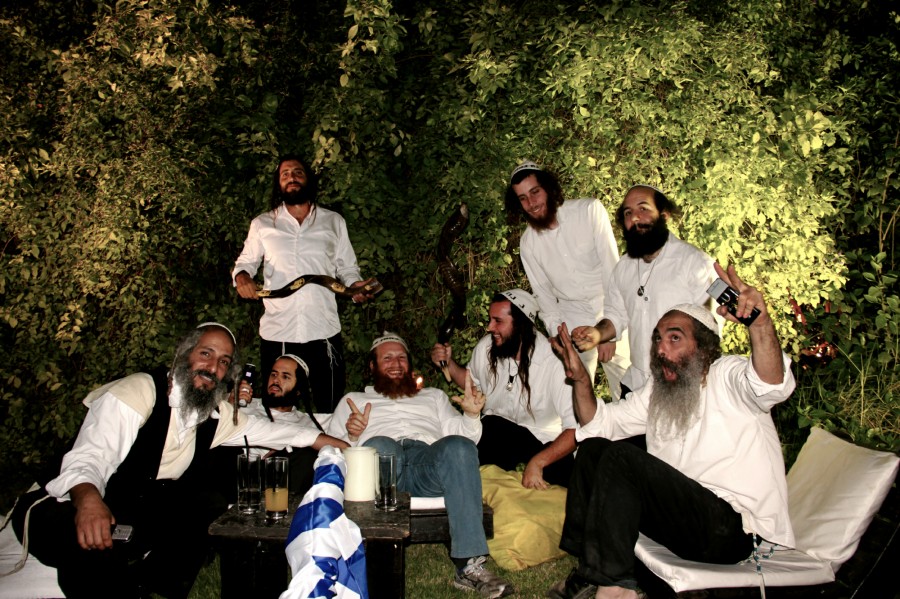 A group of Na Nachs goof off before a wedding performance in Tel Aviv.