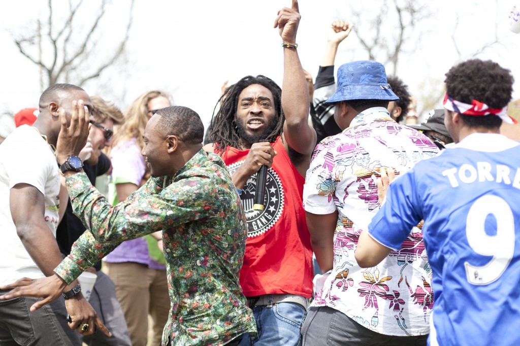 Ben Frank Jr. (center) of the Atlanta-based hip-hop duo Big Face Paper Gang parties with the crowd at Broccoli City Festival, Saturday April 19, 2014.