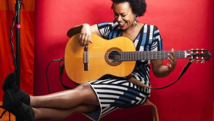 Ethiopian-born singer Meklit Hadero shows off her guitar chops and her perfect afro.