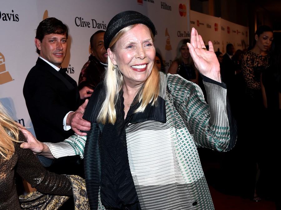 Musician Joni Mitchell attends a party before the Grammy Awards in February. Mitchell, 71, was found unconscious in her home Tuesday.
