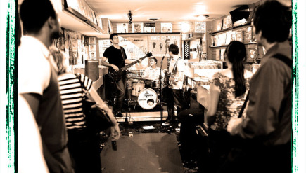 D.C. record store Crooked Beat (pictured during an in-store show in 2007) may be leaving Adams Morgan, according to owner Bill Daly.